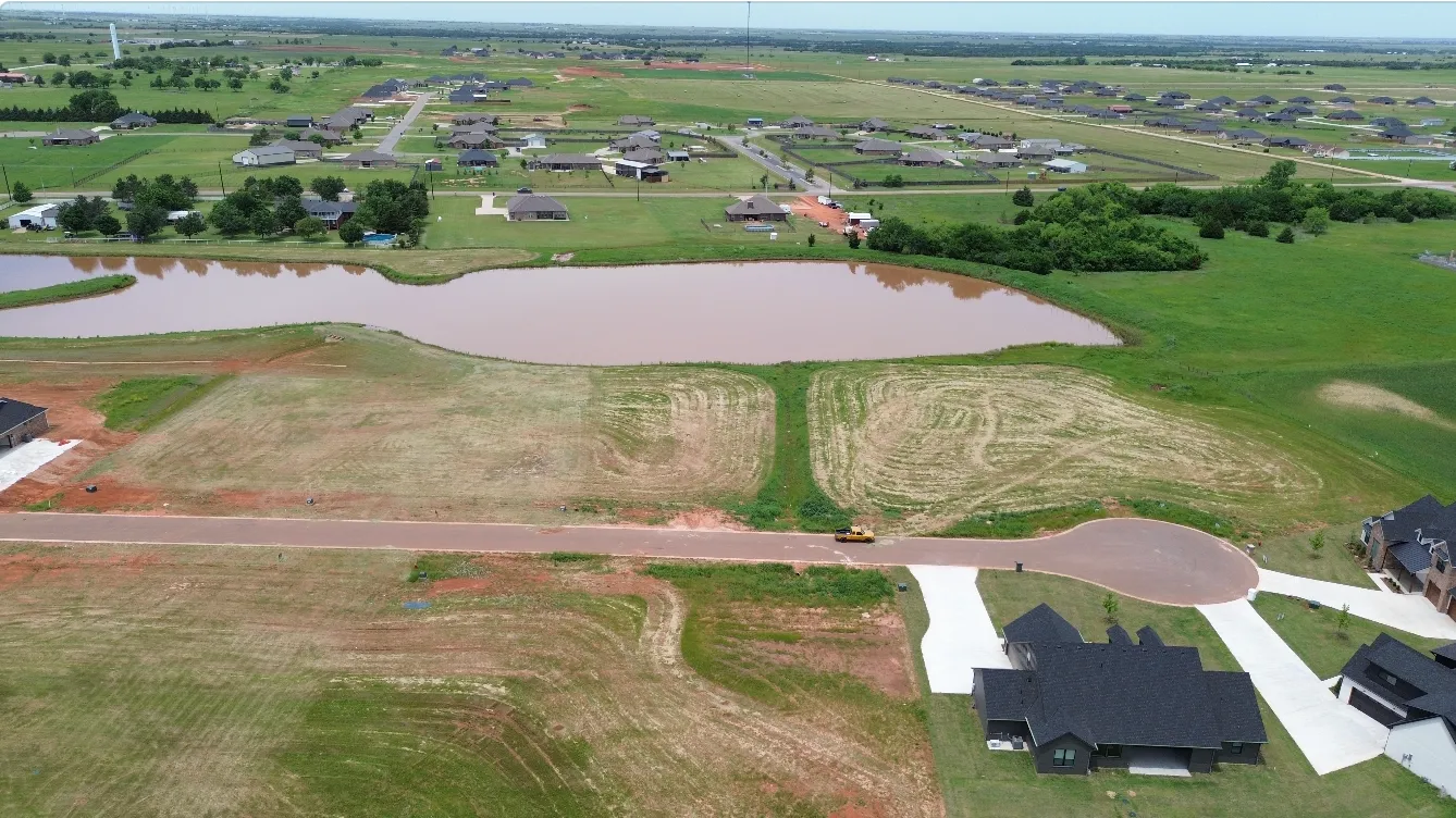 new home development surrounding a lake